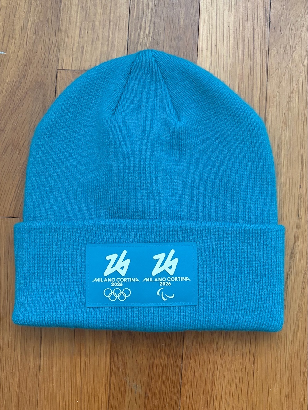 Milano cortina 2026 Winter Olympics Salomon teal blue knit beanie